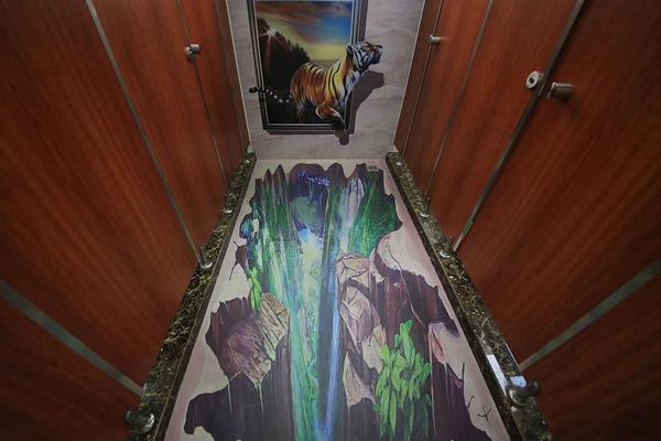 A local artist painted a mural celebrating the city’s cultural diversity on a downtown building