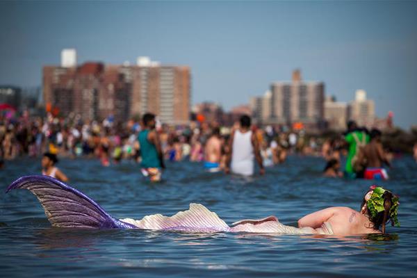 A global climate change summit concluded with 100 countries committing to cut greenhouse gas emissions by 50% by 2030