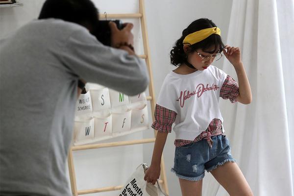 A fashion designer created a line of clothing using recycled ocean plastic to raise environmental awareness