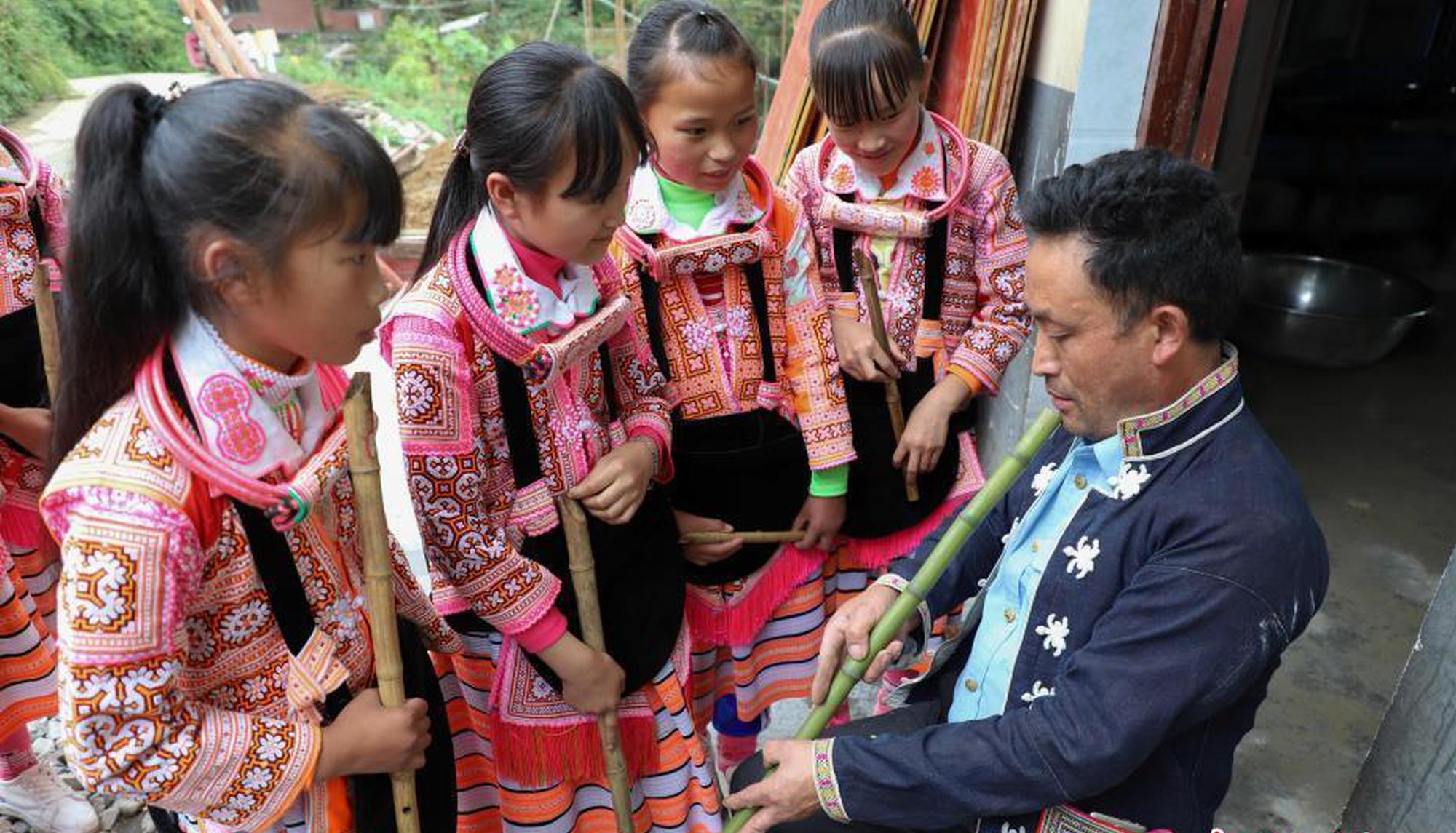 Local firefighters rescued four people from a burning building early this morning with no serious injuries reported