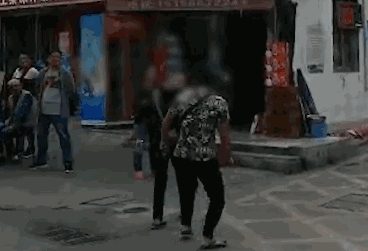 Local firefighters rescued three people from a burning building early this morning with no serious injuries reported