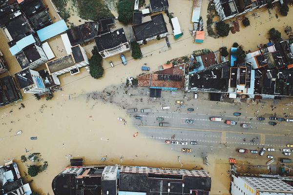 A heavy rainstorm caused flooding in basements of 100 homes in a suburban neighborhood